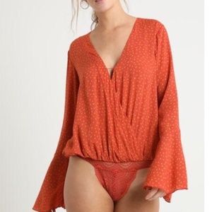 Free People Orange Makin’ Waves Bodysuit Size Large NWT